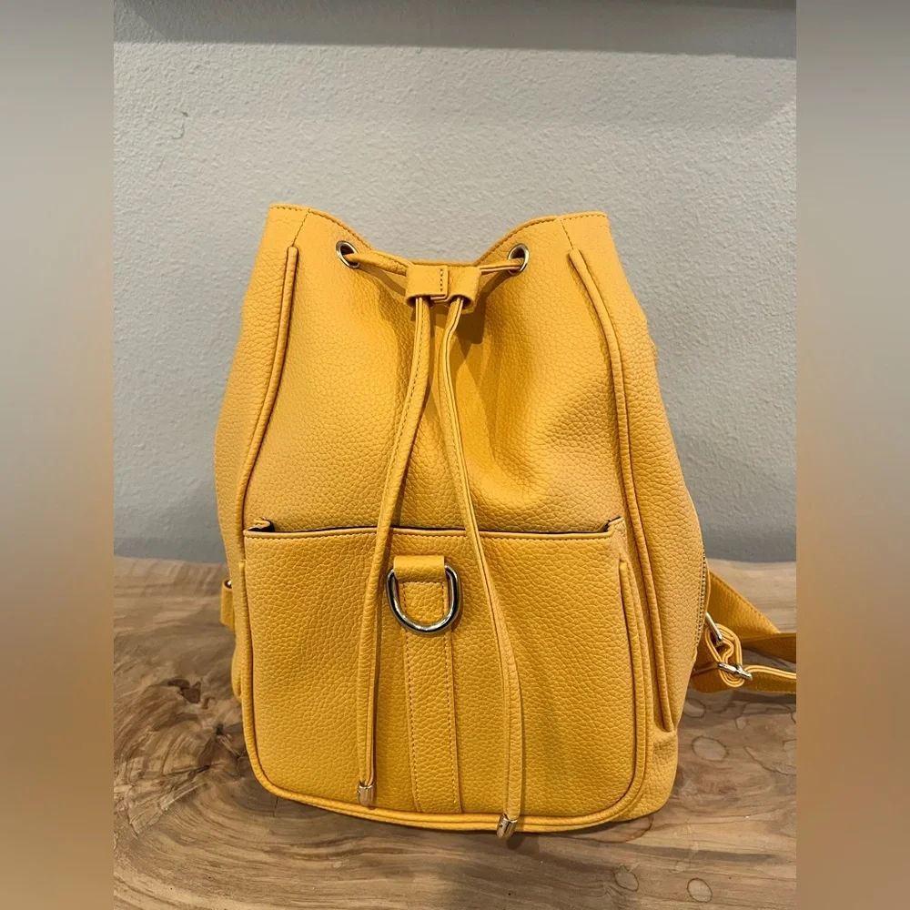 Yellow Textured Pleather Backpack with Silver Clasp